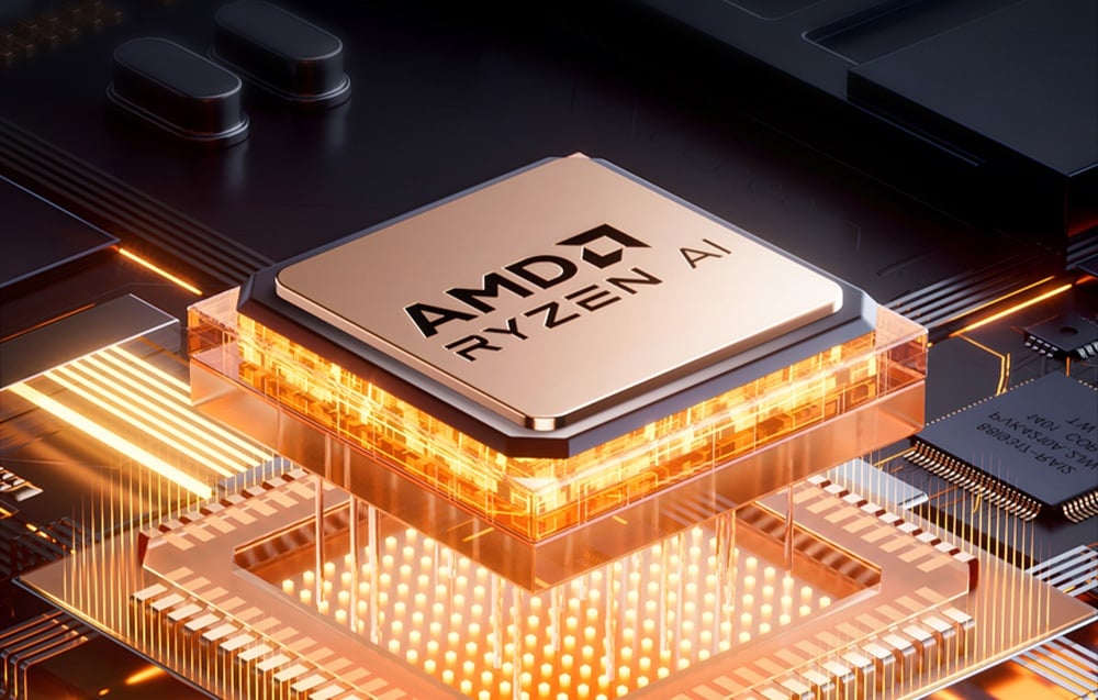 Κοντινό πλάνο του επεξεργαστή AMD Ryzen σε πορτοκαλί και μαύρο φόντο.