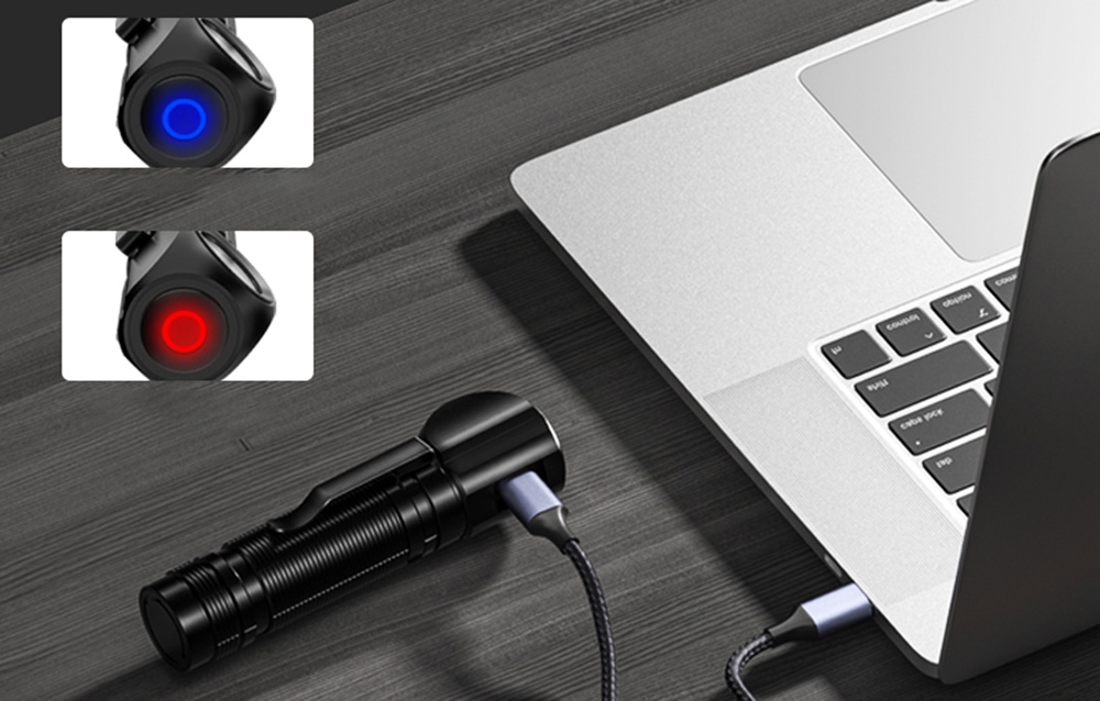 Μαύρος φακός με καλώδιο USB συνδεδεμένος σε φορητό υπολογιστή, με εικονίδια που δείχνουν μπλε και κόκκινο φως