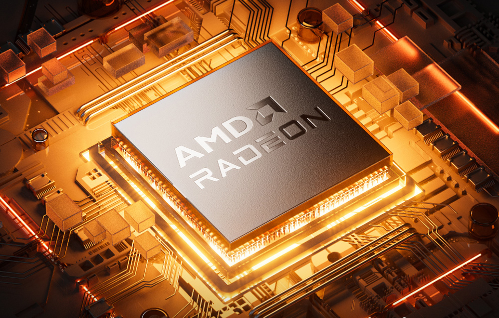 Κοντινό πλάνο του τσιπ AMD Radeon τοποθετημένο στη μητρική πλακέτα με πορτοκαλί οπίσθιο φωτισμό