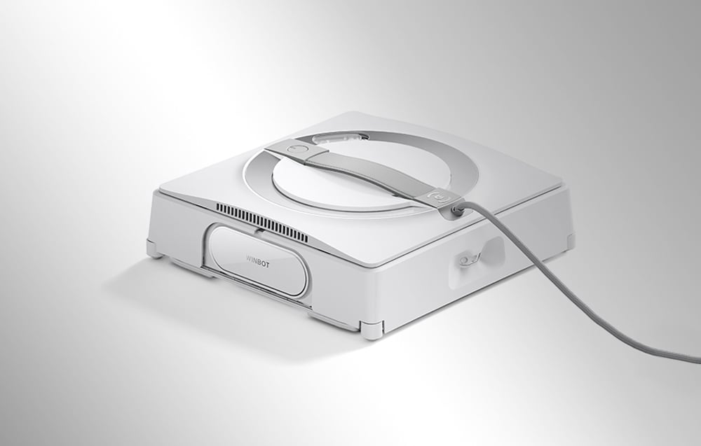 Ρομπότ καθαρισμού παραθύρων Ecovacs W2 Pro σε λευκό χρώμα σε γκρι φόντο.
