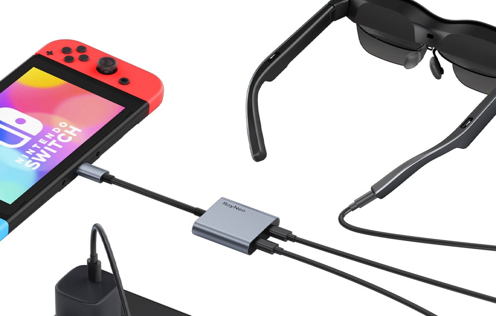 Κονσόλα Nintendo Switch συνδεδεμένη με τα έξυπνα γυαλιά RayNeo χρησιμοποιώντας τον προσαρμογέα USB-C και το καλώδιο τροφοδοσίας.