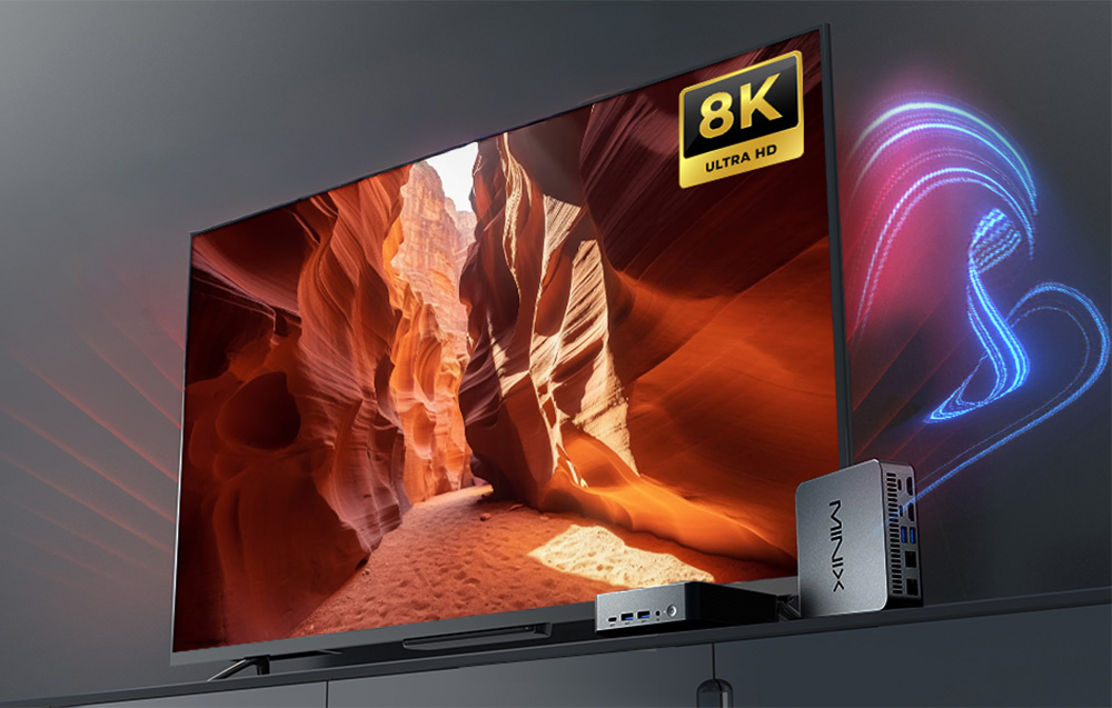 Μια οθόνη με εικόνα 8K, δίπλα της στέκεται το Mini PC N512 συνδεδεμένο στην οθόνη.