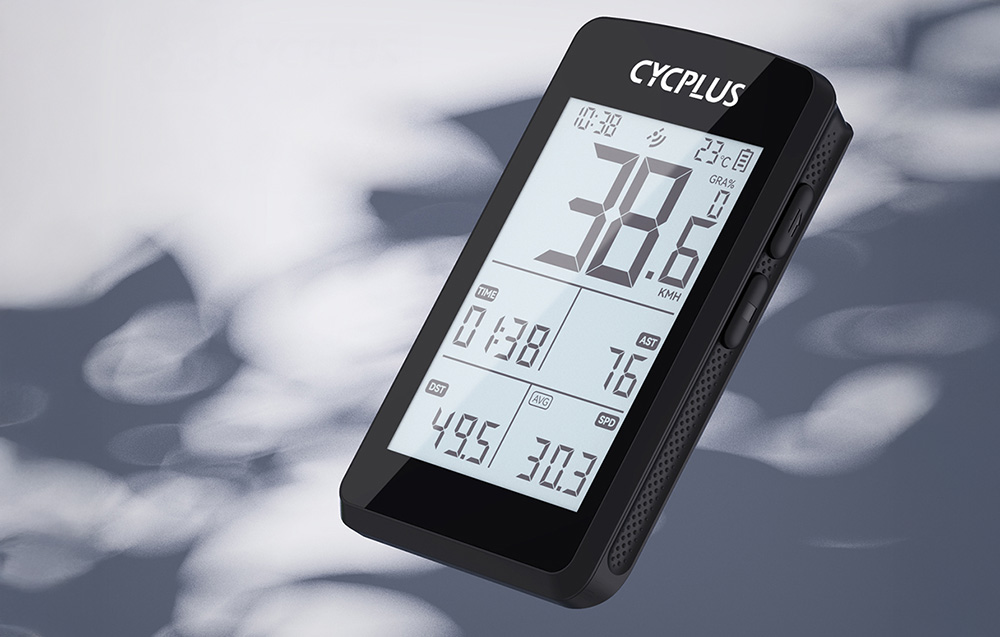 Υπολογιστής ποδηλάτου Cycplus M3 με οθόνη που δείχνει ταχύτητα 38,6 km/h σε θολό φόντο