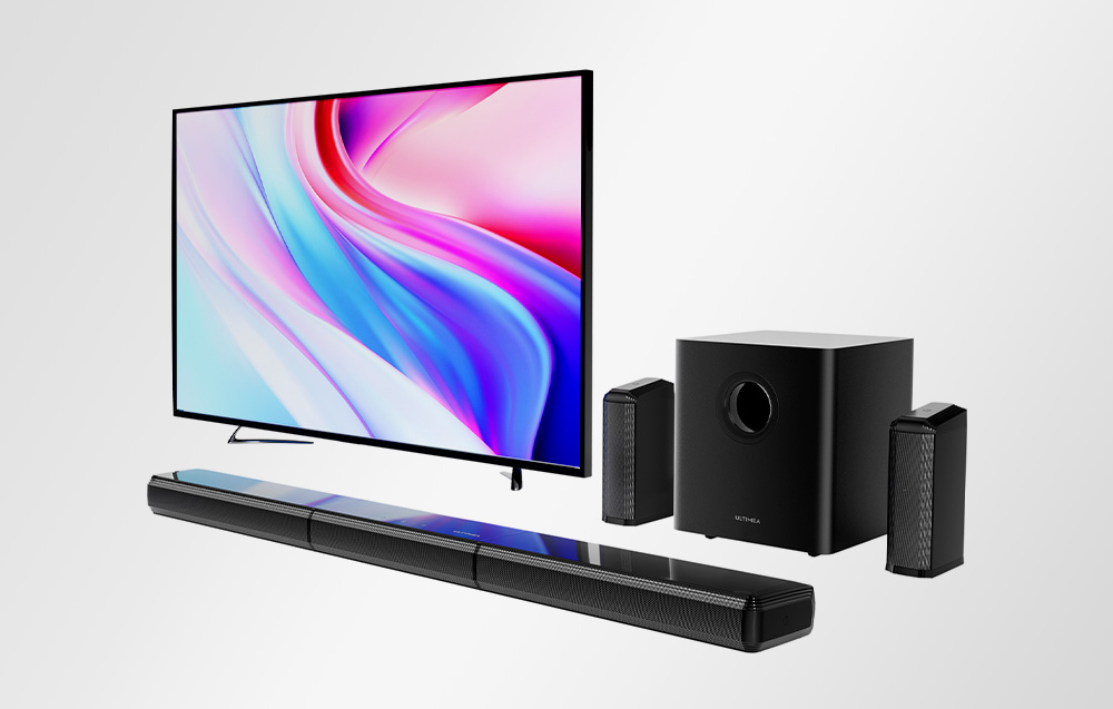 Σύστημα home theater με ηχομπάρα, υπογούφερ, δύο ηχεία και τηλεόραση.
