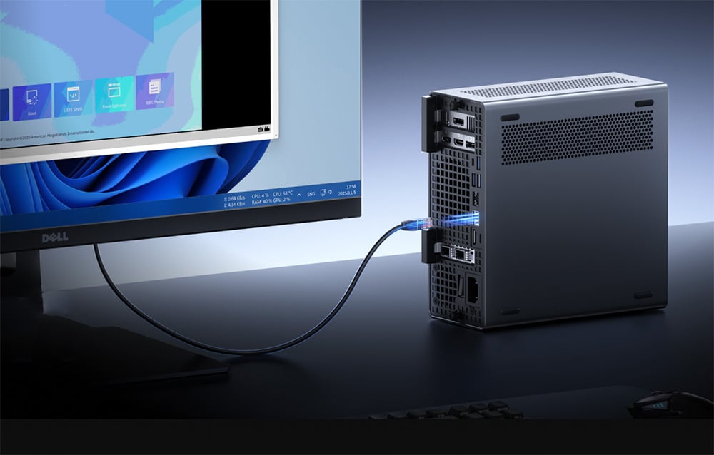 Υπολογιστής σε γραφείο με καλώδιο Ethernet συνδεδεμένο σε αυτόν, οθόνη Dell στα αριστερά