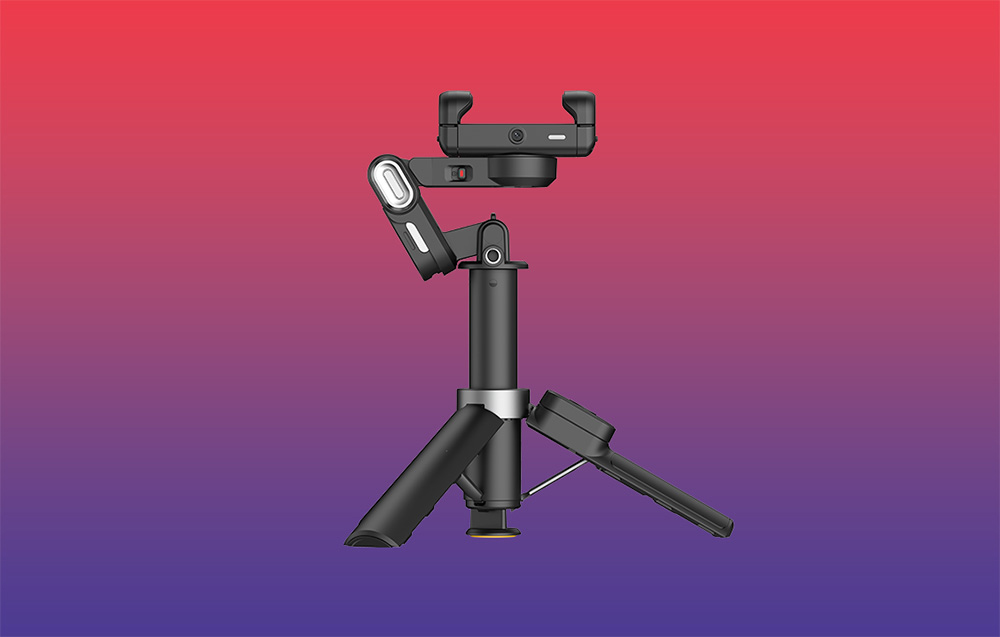 Gimbal τοποθετημένο σε μίνι τρίποδο, πλάγια όψη, πάνω σε φόντο με κόκκινο-μοβ ντεγκραντέ.
