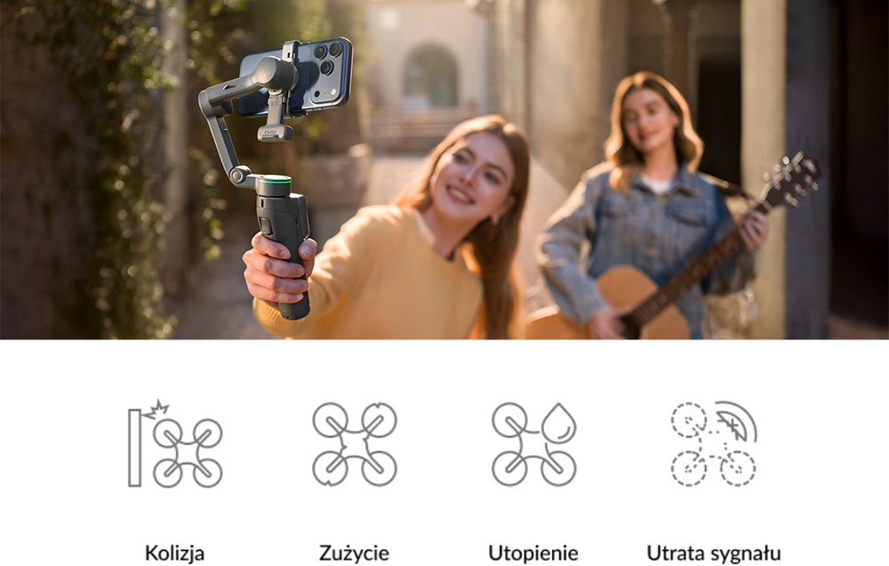 Μια γυναίκα κρατά ένα γιμπάλ με ένα smartphone και τραβάει μια selfie, ενώ μια άλλη γυναίκα στο παρασκήνιο παίζει κιθάρα· στο κάτω μέρος της εικόνας, είναι ορατά τέσσερα εικονίδια με λεζάντες: Σύγκρουση, Φθορά, Ζημιά από νερό, Απώλεια σήματος