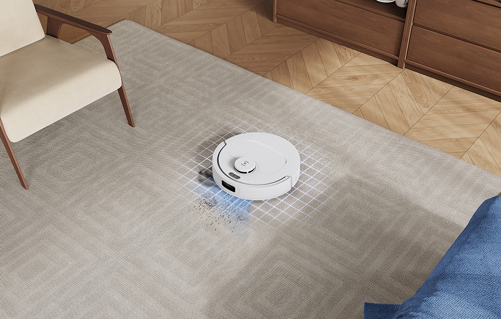 Ένα ρομπότ καθαρισμού ECOVACS απομακρύνει τη βρωμιά από ένα ανοιχτόχρωμο χαλί