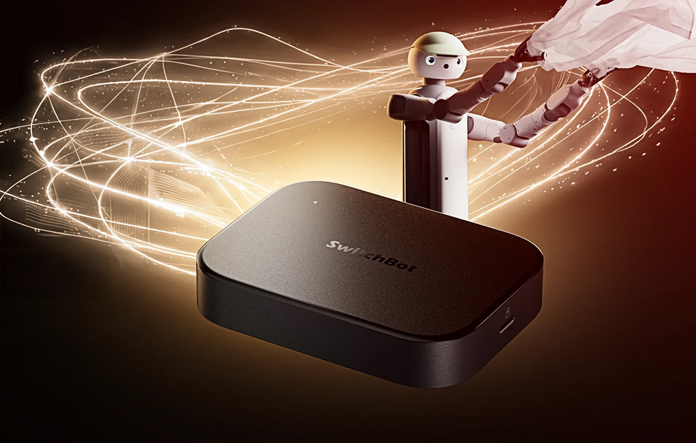 Το SwitchBot Gateway εμφανίζεται σε σκούρο φόντο με ένα ανθρωποειδές ρομπότ και ελαφριά γραφικά εφέ στο παρασκήνιο.