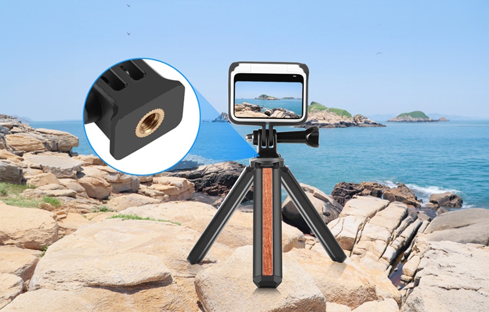 Κάμερα Insta360 GO 3 σε μαύρη θήκη πάνω σε τρίποδο με κοντινή λήψη του σπειρώματος στήριξης 1/4 ιντσών