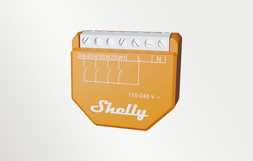 Ένα πορτοκαλί ηλεκτρικό module με την ένδειξη «Shelly» και υποδοχές σε ανοιχτόχρωμο φόντο