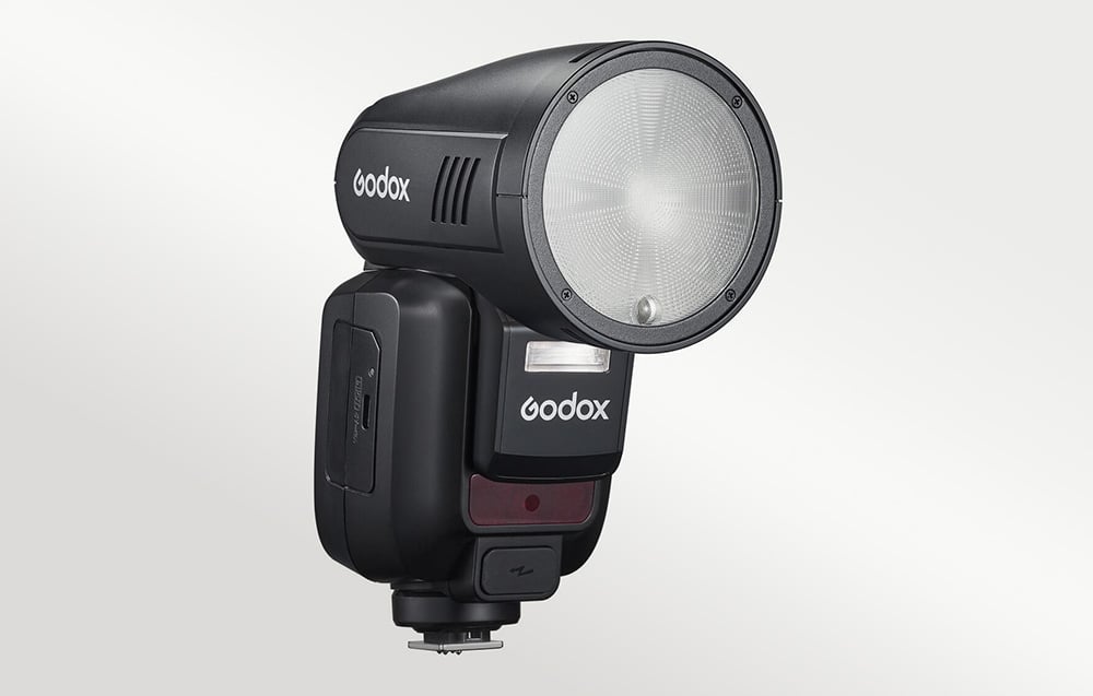 Φλας Godox V100C με στρογγυλή κεφαλή, σε πλάγια όψη.