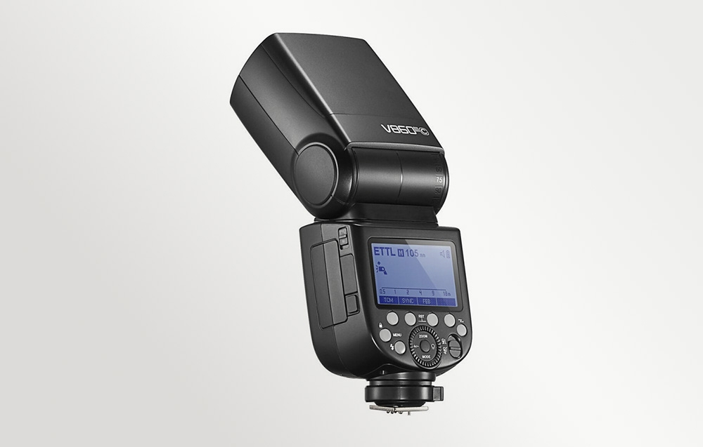 Πίσω όψη του φλας Godox V860III με οθόνη LCD με οπίσθιο φωτισμό, κουμπιά και επιλογέα ελέγχου