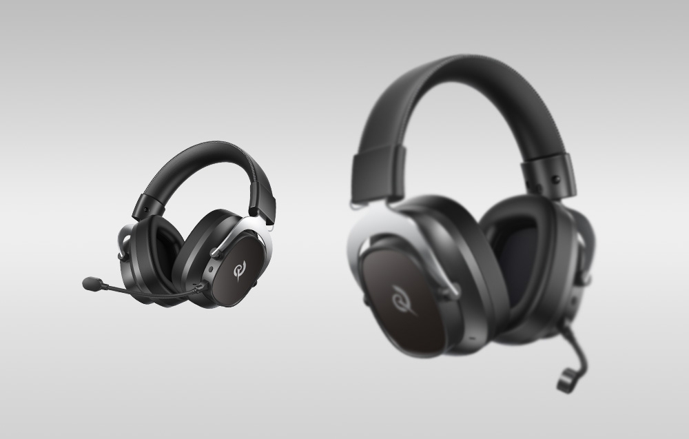 Δύο ζεύγη μαύρων ακουστικών gaming QCY Heroad VT200 σε φόντο με γκρι ντεγκραντέ· το πρώτο ζεύγος στο προσκήνιο είναι θολωμένο, ενώ το δεύτερο ζεύγος στο βάθος είναι εστιασμένο
